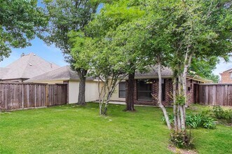 9214 Chimneywood Dr in Rowlett, TX - Building Photo - Building Photo