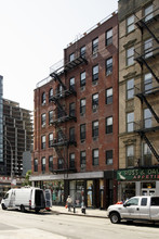 181-185 E Houston St in New York, NY - Building Photo - Building Photo