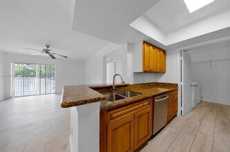 5760 Rock Island Rd in Tamarac, FL - Building Photo - Building Photo