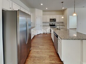 7801 Stumble Journey Ln in Progress Village, FL - Foto de edificio - Building Photo