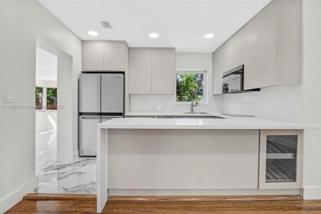 property at 6437 SW 14th St