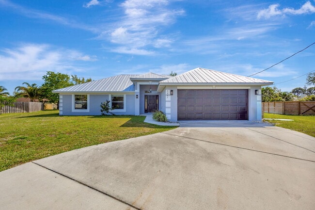 property at 5647 NW Lorna Ct