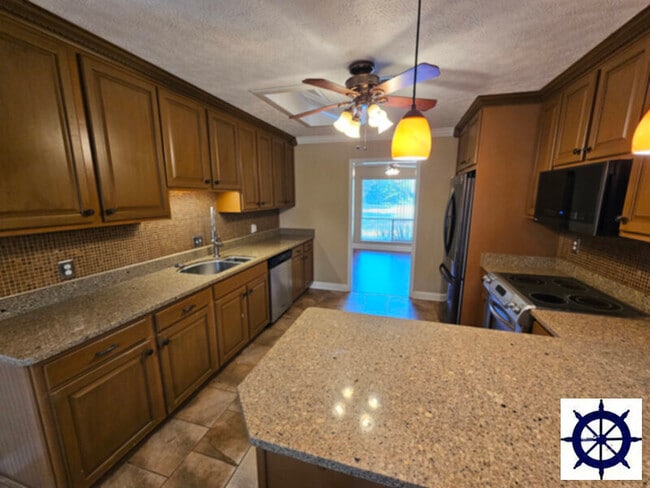 2417 Pretty Bayou Island Dr in Panama City, FL - Building Photo - Building Photo