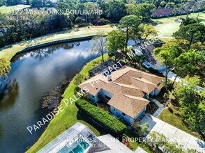 8122 Misty Oaks Blvd in Sarasota, FL - Building Photo - Building Photo