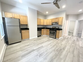 174 Bolton St, Unit 1 in Boston, MA - Building Photo - Building Photo