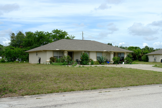 Palmetto Court Apartments in New Smyrna Beach, FL - Building Photo - Building Photo