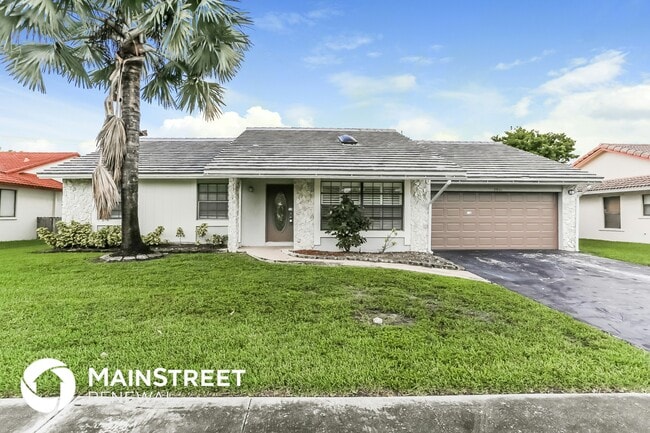 property at 7911 NW 20th St
