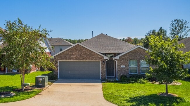 977 Oak Lynn Dr in Willis, TX - Building Photo - Building Photo