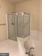 7871 Rolling Woods Ct-Unit -104 in West Springfield, VA - Building Photo - Building Photo