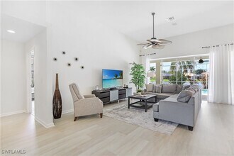 7699 Groves Rd in Naples, FL - Building Photo - Building Photo
