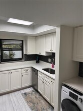 1 Windrush Blvd in Indian Rocks Beach, FL - Foto de edificio - Building Photo