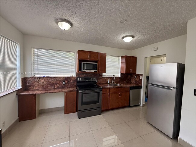 property at 883 NE 40th St