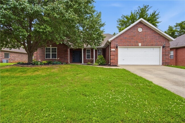 property at 305 NW Palomino St