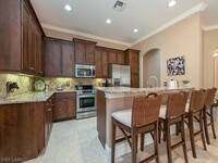 8000 Cordoba Pl in Naples, FL - Building Photo - Building Photo