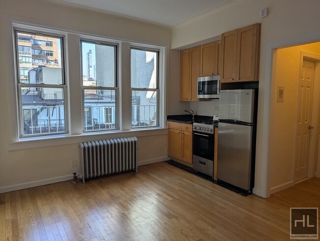 property at 117 W 13th St