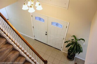 6586 Carriage Hills Dr in Canton Township, MI - Building Photo - Building Photo
