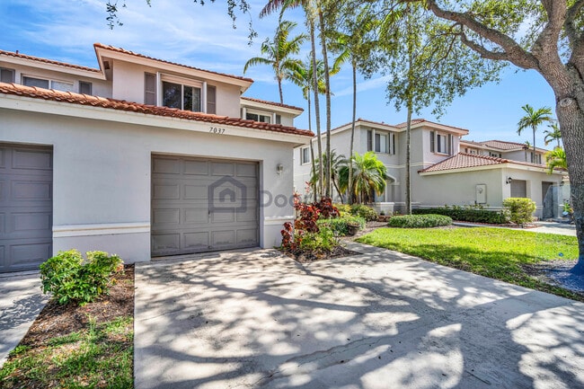 7037 Hawks Nest Ter in Riviera Beach, FL - Building Photo - Building Photo