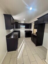 156 E 67th St in Los Angeles, CA - Foto de edificio - Building Photo