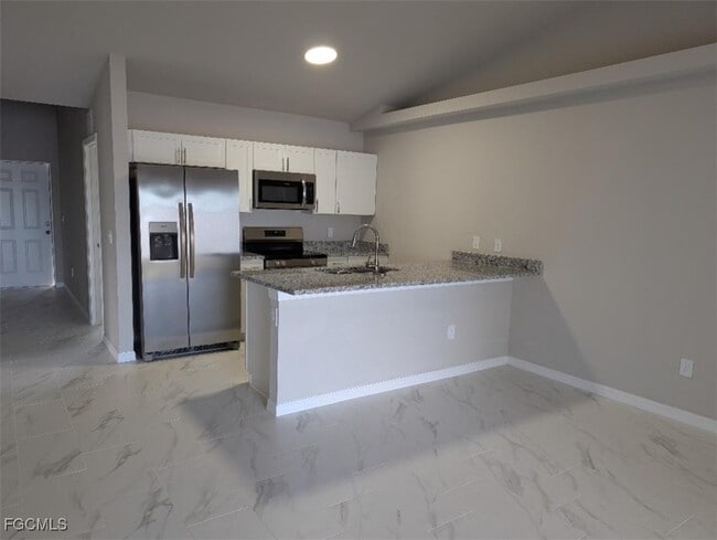 1406 SE 1st Pl in Cape Coral, FL - Building Photo - Building Photo