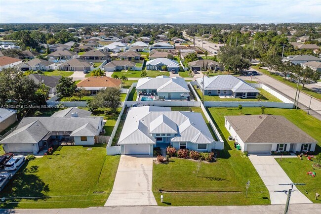 4609 SW Pearl St in Port St. Lucie, FL - Building Photo - Building Photo