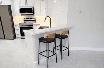 9055 Wiles Rd in Coral Springs, FL - Building Photo - Building Photo