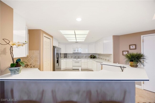 property at 7117 Pelican Bay Blvd