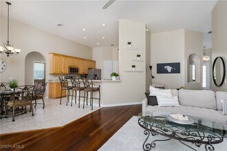23432 Olde Meadowbrook Cir in Bonita Springs, FL - Building Photo - Building Photo