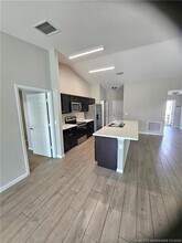 1410 SW Flounder Ln in Port St. Lucie, FL - Building Photo - Building Photo