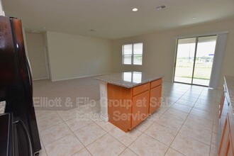 8914 Hinsdale Heights Dr in Polk City, FL - Building Photo - Building Photo