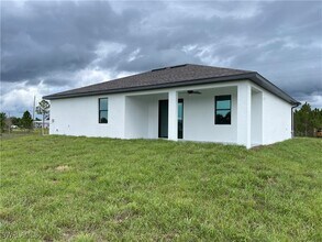 821 Newell St E in Lehigh Acres, FL - Building Photo - Building Photo