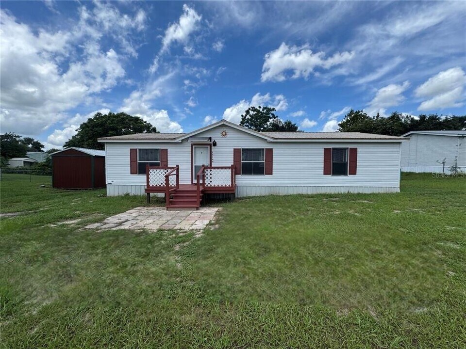 14144 SE 63rd Terrace in Summerfield, FL - Building Photo
