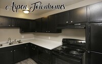 Building Photo - Aspen Townhomes Apartments in Colorado Springs, Colorado