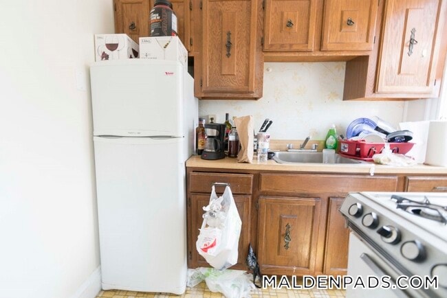 17-19-19 Washington St S, Unit 516 in Malden, MA - Foto de edificio - Building Photo