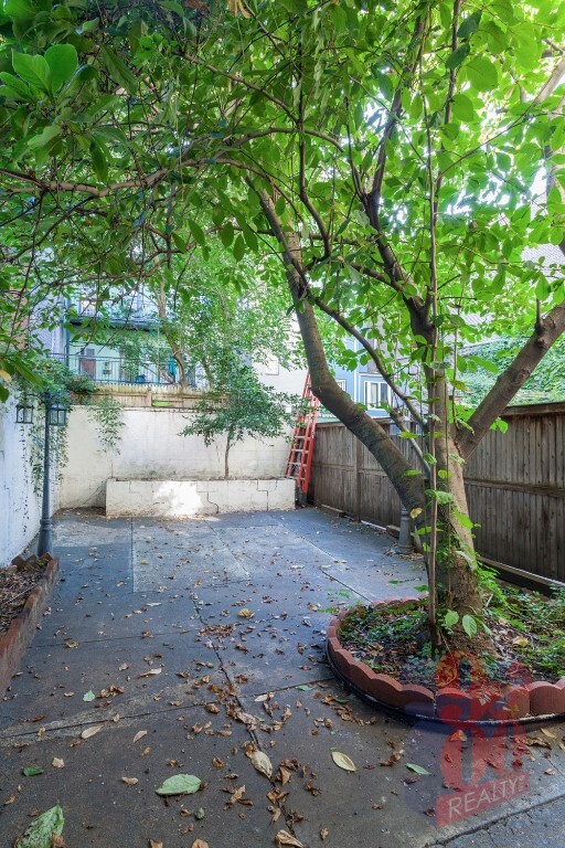 property at 230 E 32nd St