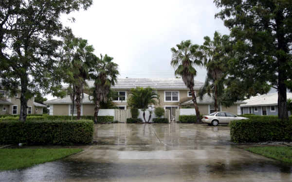 13932 Folkstone Cor in Wellington, FL - Building Photo