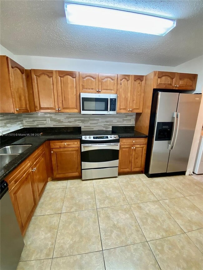 11241 W Atlantic Blvd in Coral Springs, FL - Building Photo - Building Photo