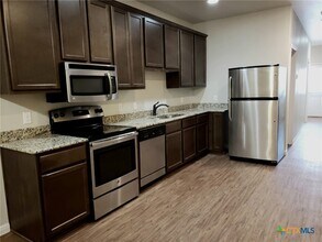 165 S Guadalupe St in San Marcos, TX - Building Photo - Building Photo