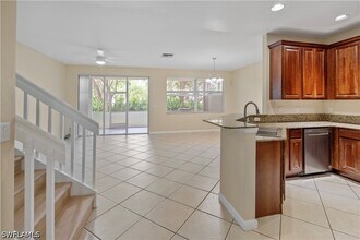 7009 Romana Way in Naples, FL - Building Photo - Building Photo