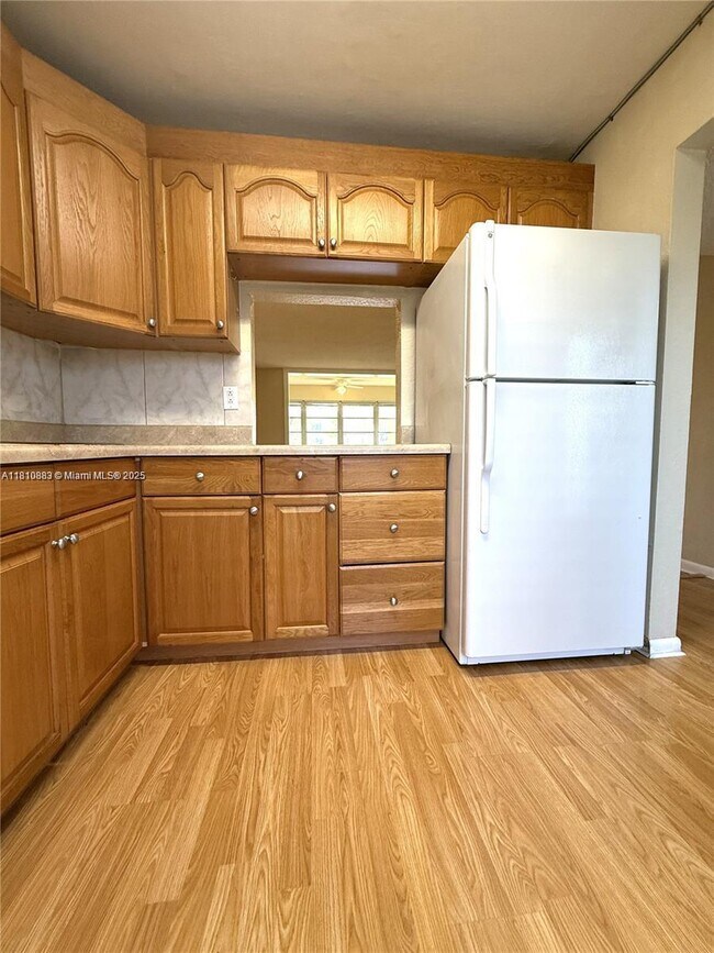 6001 NW 61st Ave in Tamarac, FL - Building Photo - Building Photo