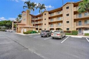 12547 Imperial Isle Dr, Unit 206 in Boynton Beach, FL - Building Photo