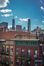 164 Mott St in New York, NY - Building Photo - Building Photo