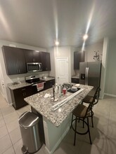 5630 Enclave Dr in West Palm Beach, FL - Building Photo - Building Photo