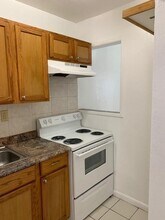 7841 Johnson St-Unit -106 in Pembroke Pines, FL - Building Photo - Building Photo