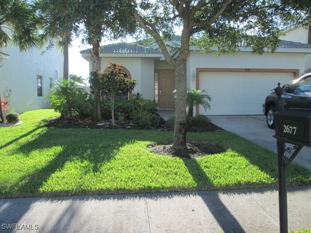 2677 Blue Cypress Lake Ct in Cape Coral, FL - Building Photo