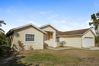 1207 Summa Blvd in Lehigh Acres, FL - Building Photo - Building Photo