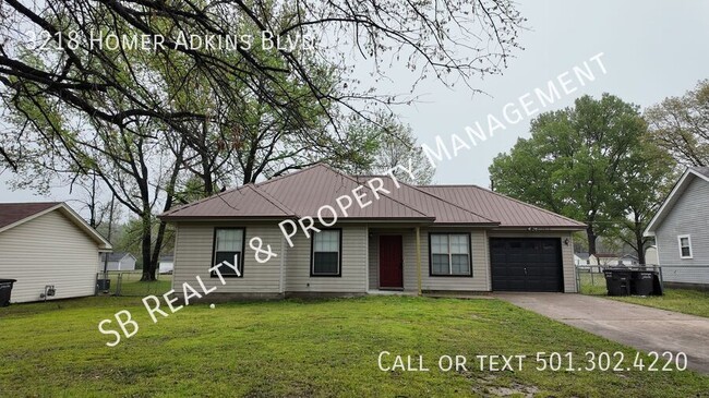 property at 3218 Homer Adkins Blvd