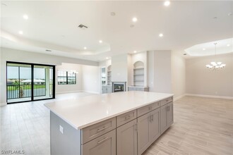 15244 Zeno Wy-Unit -201 in Naples, FL - Building Photo - Building Photo