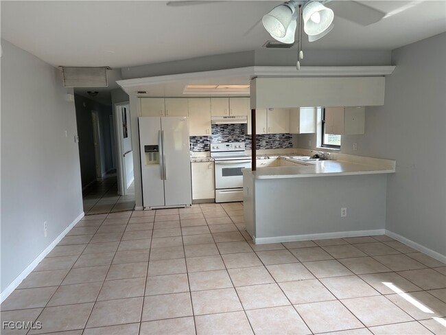 property at 3309-3307 SW Santa Barbara Pl