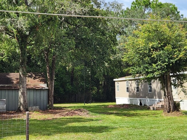 property at 1400 NW 119th Ct