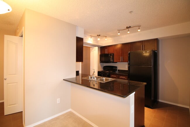 property at 11816-11822 22 Ave SW